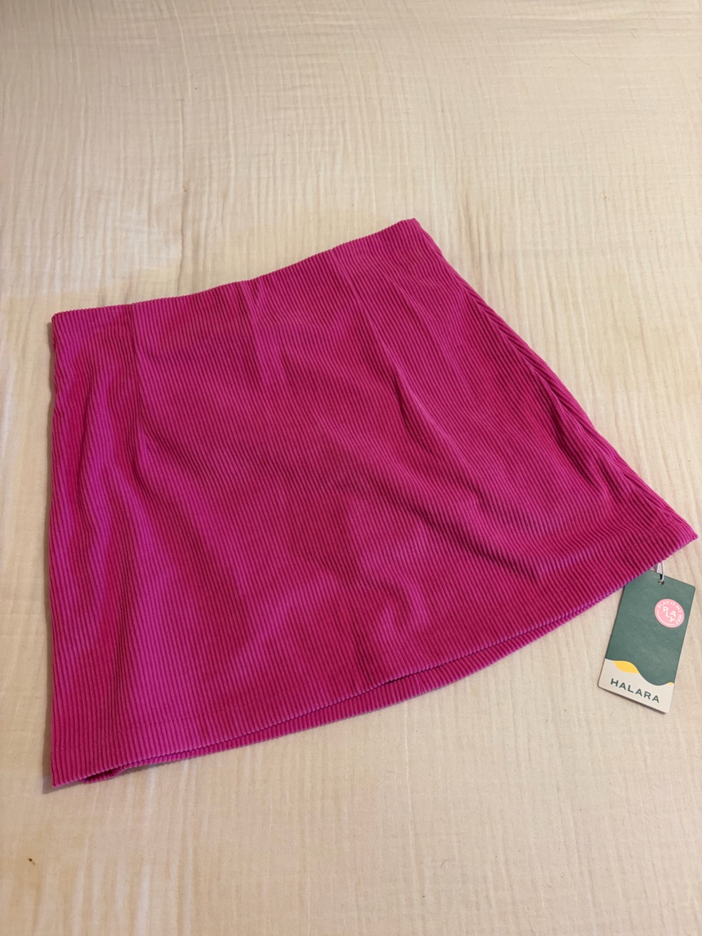 HALARA corduroy mini Skort in Magenta